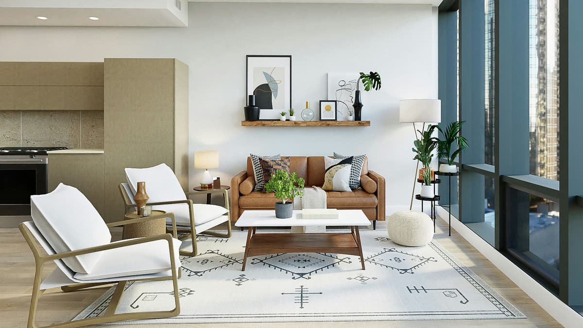 Bright living room with freshly painted white walls, leather sofa and patterned rug in a Breadsall home